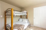 Bunk room with gorgeous natural light and a full/twin bed 